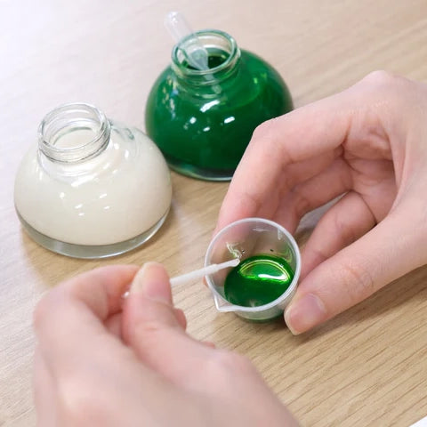 Perlmuttlösung für Tinte